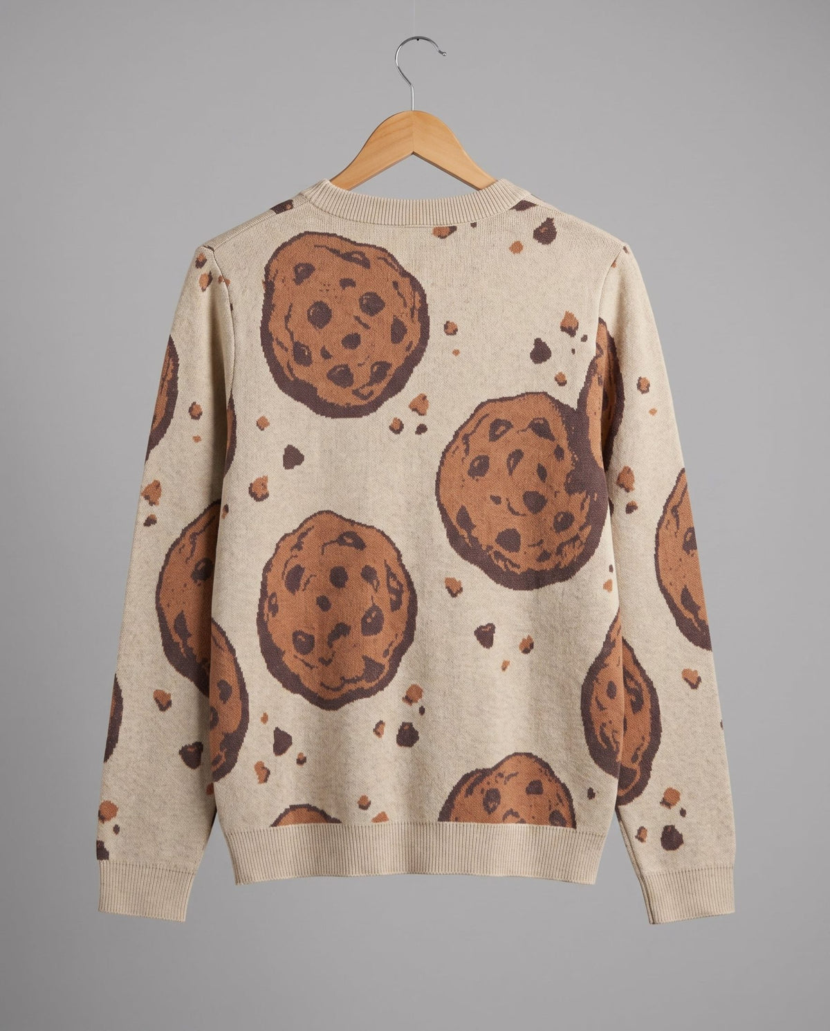 Back view of beige unisex sweater featuring repeating cookie design