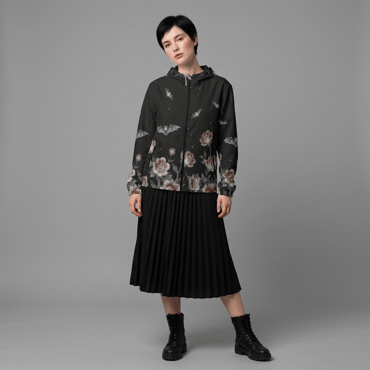Full outfit styling of bat print jacket with combat boots