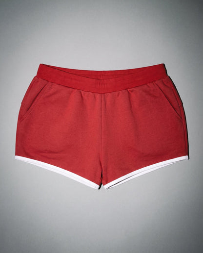Red heathered stretch shorts with side pockets and white contrast hem front view