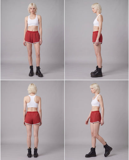 Red soft stretch shorts with elastic waist and pockets for casual wear