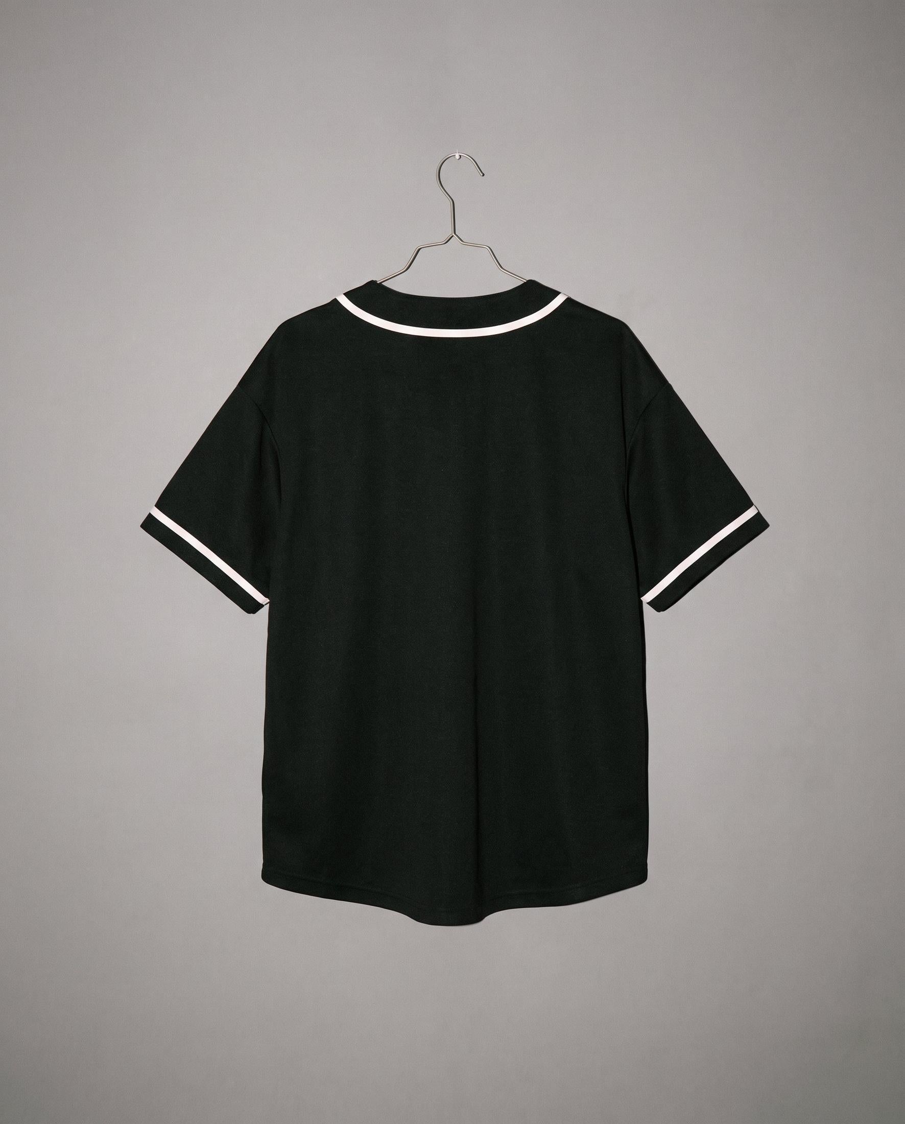 Black relaxed unisex short sleeve button up shirt with heathered texture and white trim