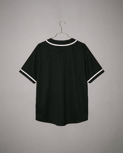 Black relaxed unisex short sleeve button up shirt with heathered texture and white trim