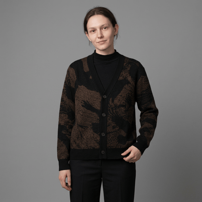 Relaxed fit knit cardigan with V-neck, buttons, and emerging crow silhouettes