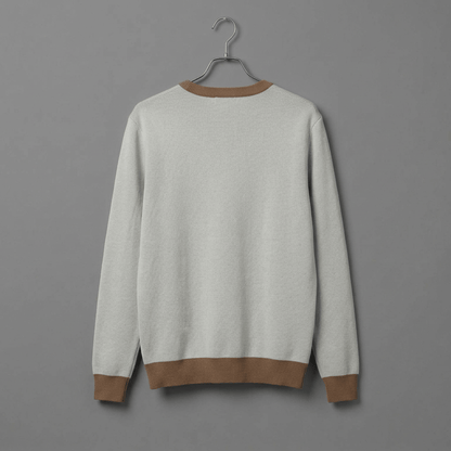 Back view of solid powder blue V-neck sweater with brown ribbed trim