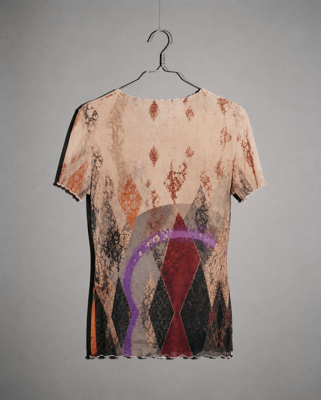 HARLEQUIN sheer mesh top back view with harlequin print and raw hem