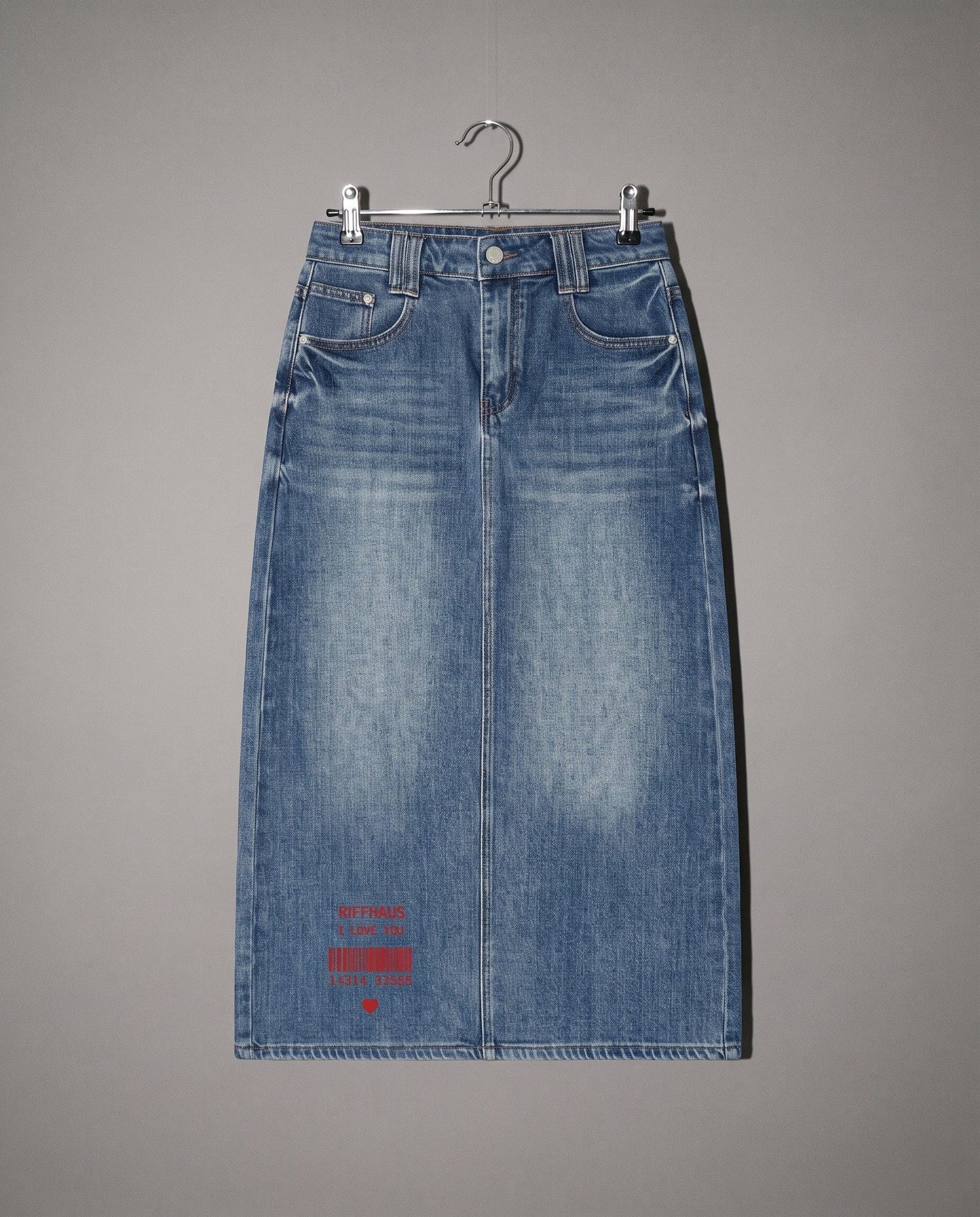 Front view blue denim midi skirt with button closure and red heart print