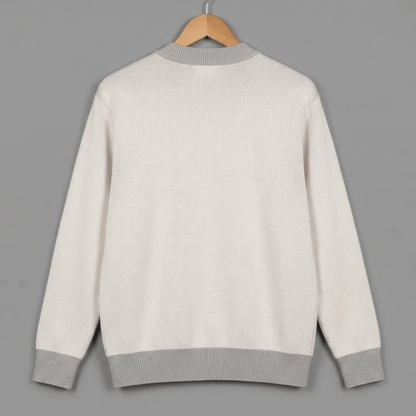 Back view of cream button-front cardigan with light gray ribbed hem and cuffs