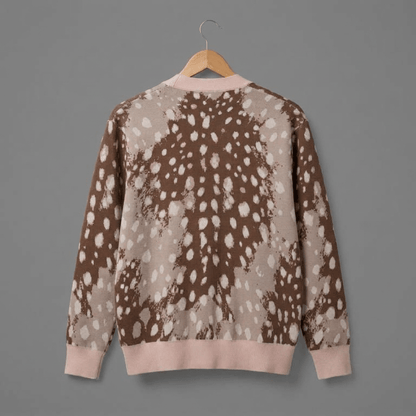 Back view of deer spot cardigan showing hem and cuff trim
