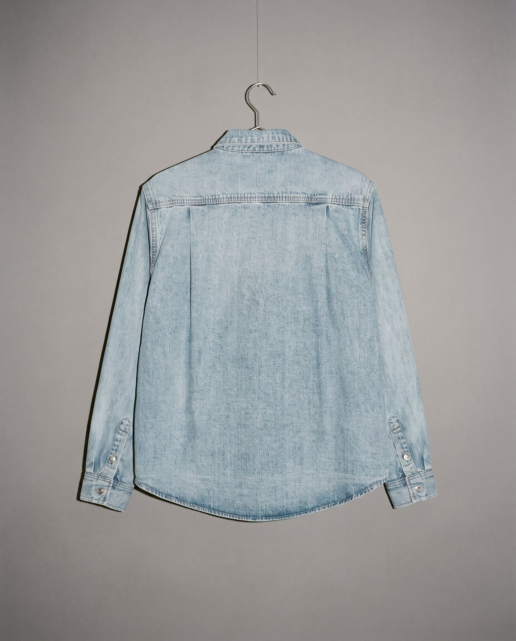 Riffhaus light-wash denim long-sleeve shirt back view with double-stitched seams