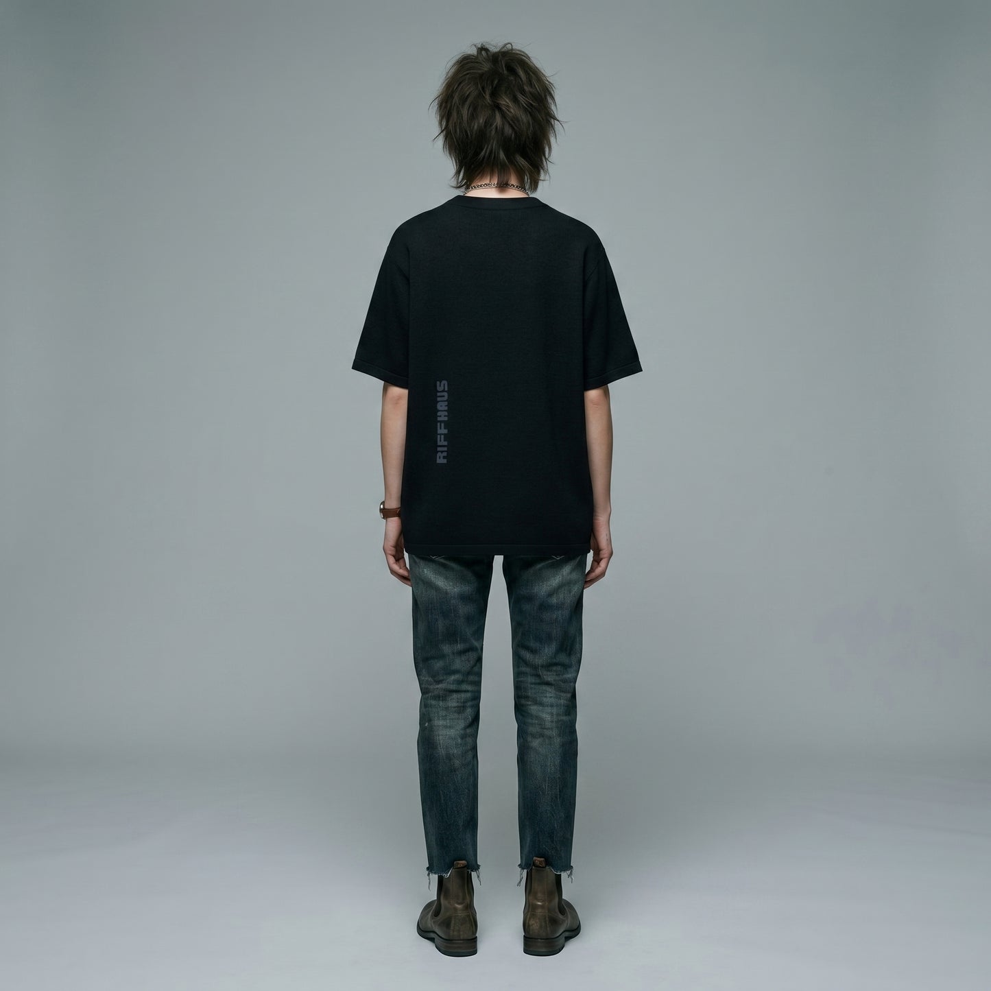 Back of black nudibranch t-shirt featuring vertical Riffhaus logo down center