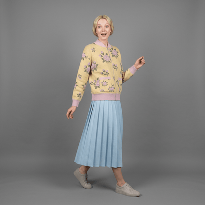 Primrose yellow knit bomber jacket with rose jacquard and lilac trim