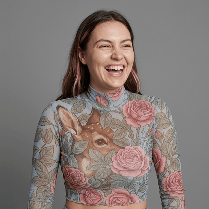 Close-up of fawn graphic on powder-blue mesh high-neck top