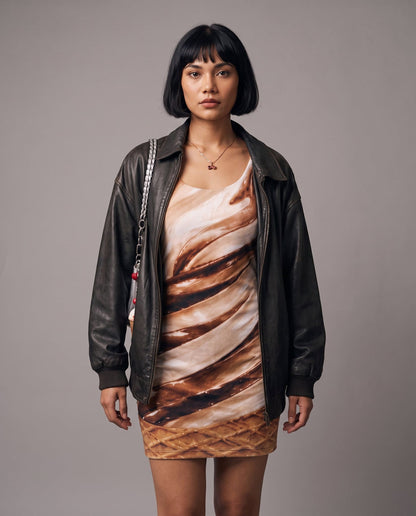 Fitted sleeveless mini dress featuring brown and cream soft-serve swirl pattern