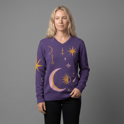 Front fit of purple celestial knit sweater with ribbed hem detail on model