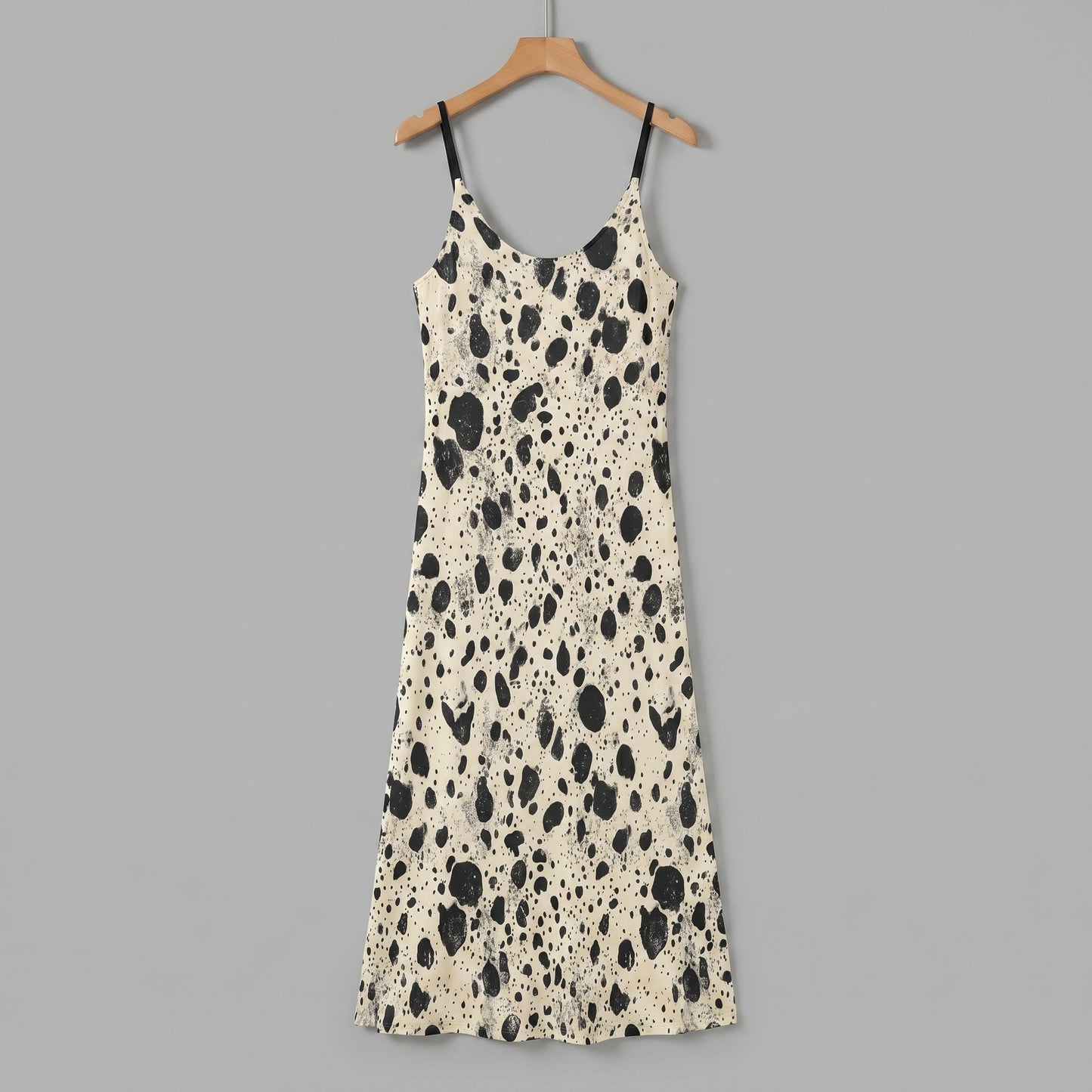 Cream A-line sling dress with black bird egg speckle pattern and pockets
