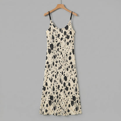 Cream A-line sling dress with black bird egg speckle pattern and pockets