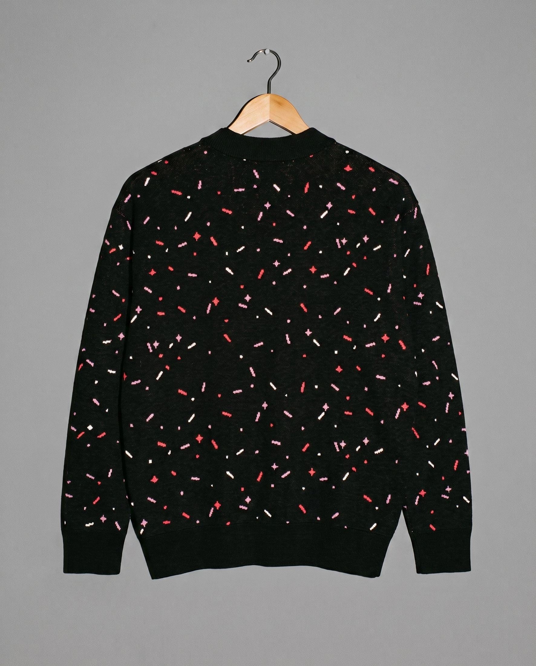 Back view of black confetti pattern knit cardigan with ribbed trim