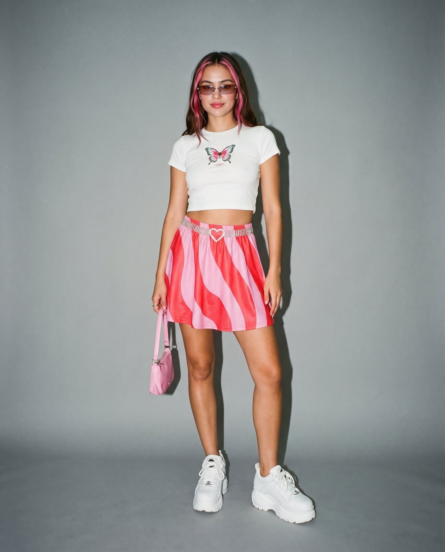 SWHIRL pink red wavy swirl flared skirt front view with elastic waistband