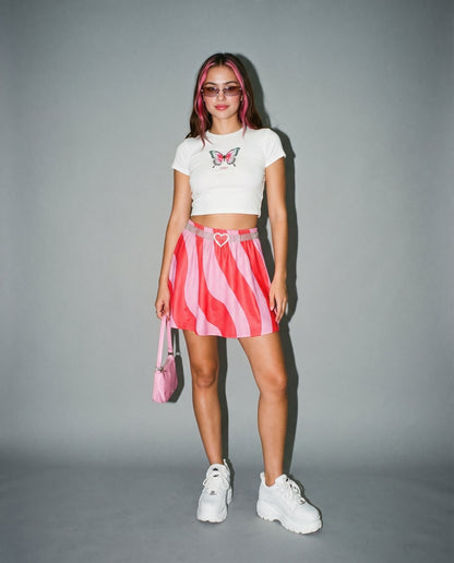 SWHIRL pink red wavy swirl flared skirt front view with elastic waistband