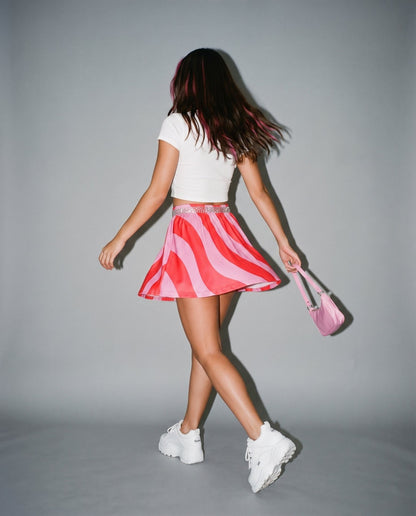 SWHIRL pink red swirl skirt rear view with rhinestone heart waist detail
