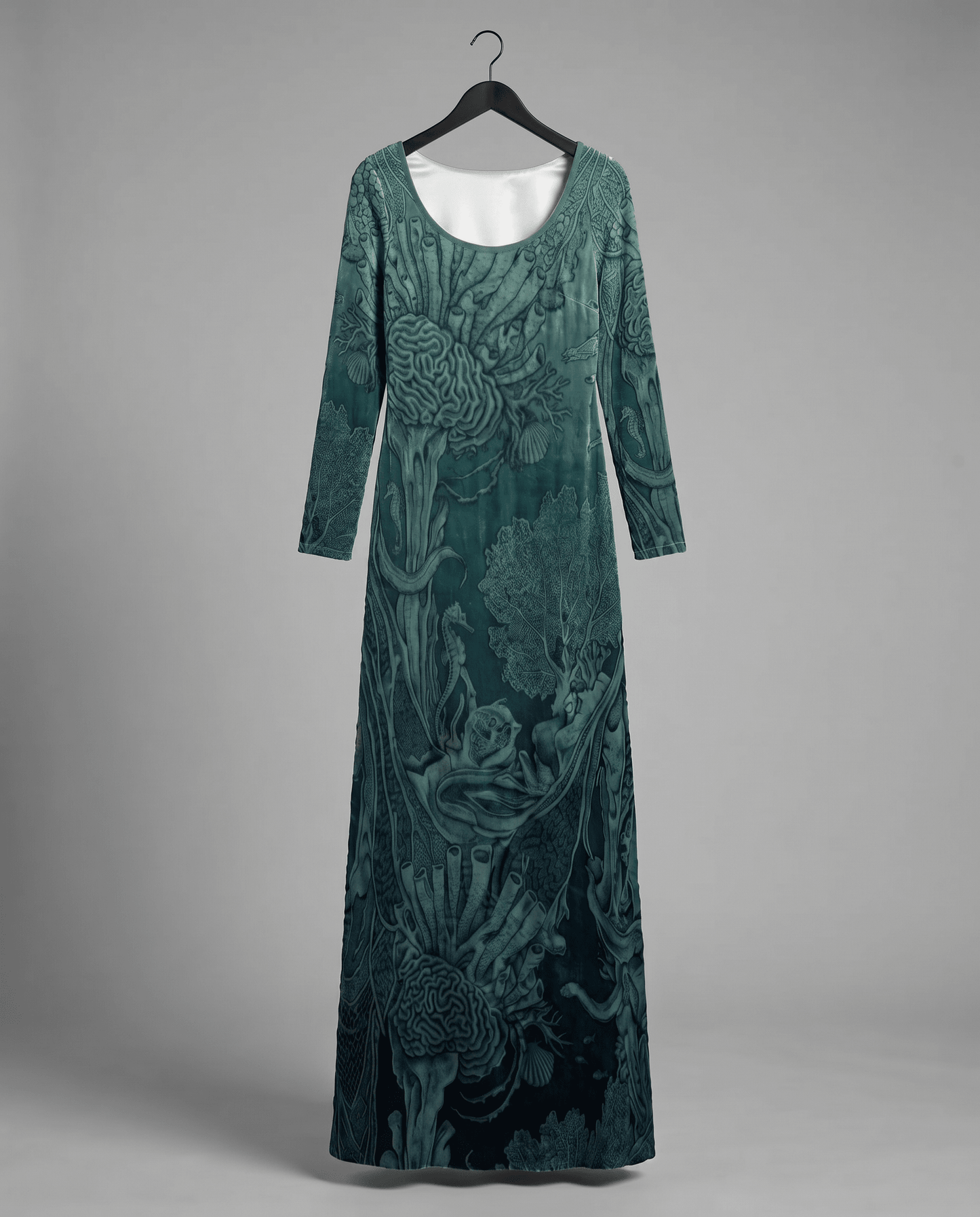 Teal gradient velvet dress on hanger featuring edge-to-edge marine reef pattern