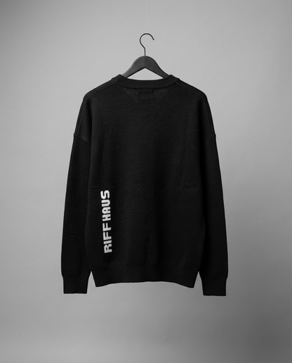 Black sweater back view with RIFF HAUS sleeve branding
