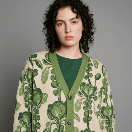 Model wearing open Brussels sprout motif cardigan with ribbed trim