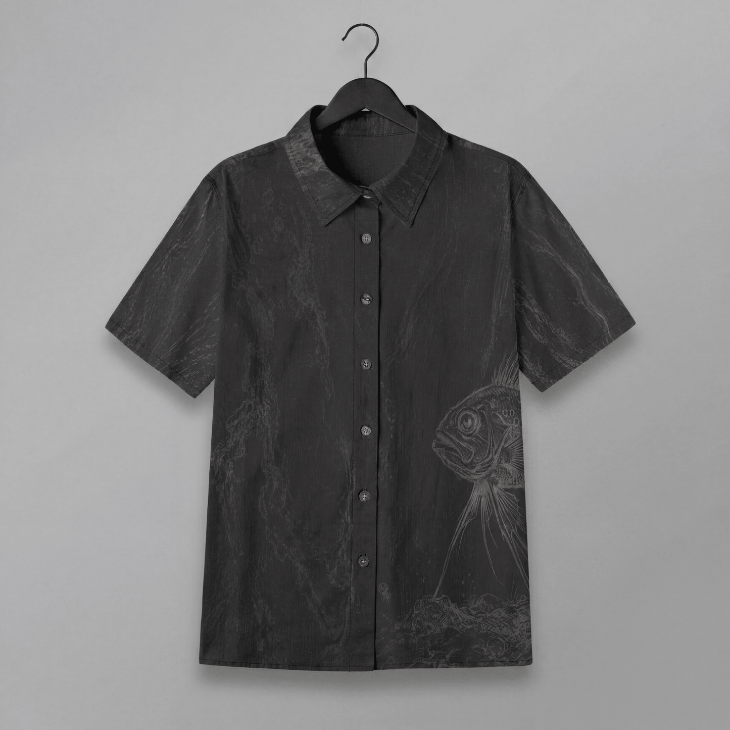 Front view of dark gray slub cotton short sleeve button up shirt with fish print