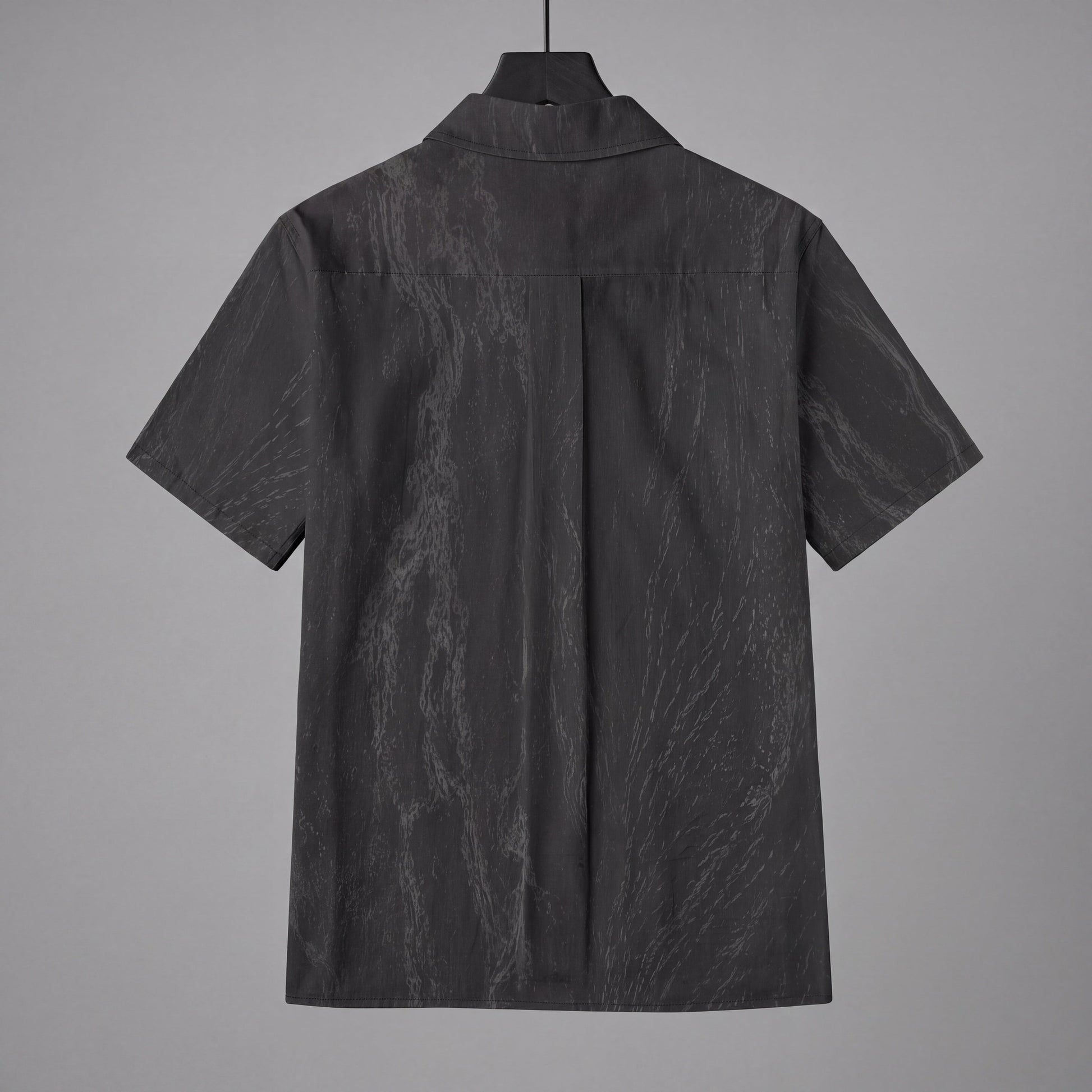 Back view of dark gray slub cotton short sleeve button up shirt on hanger