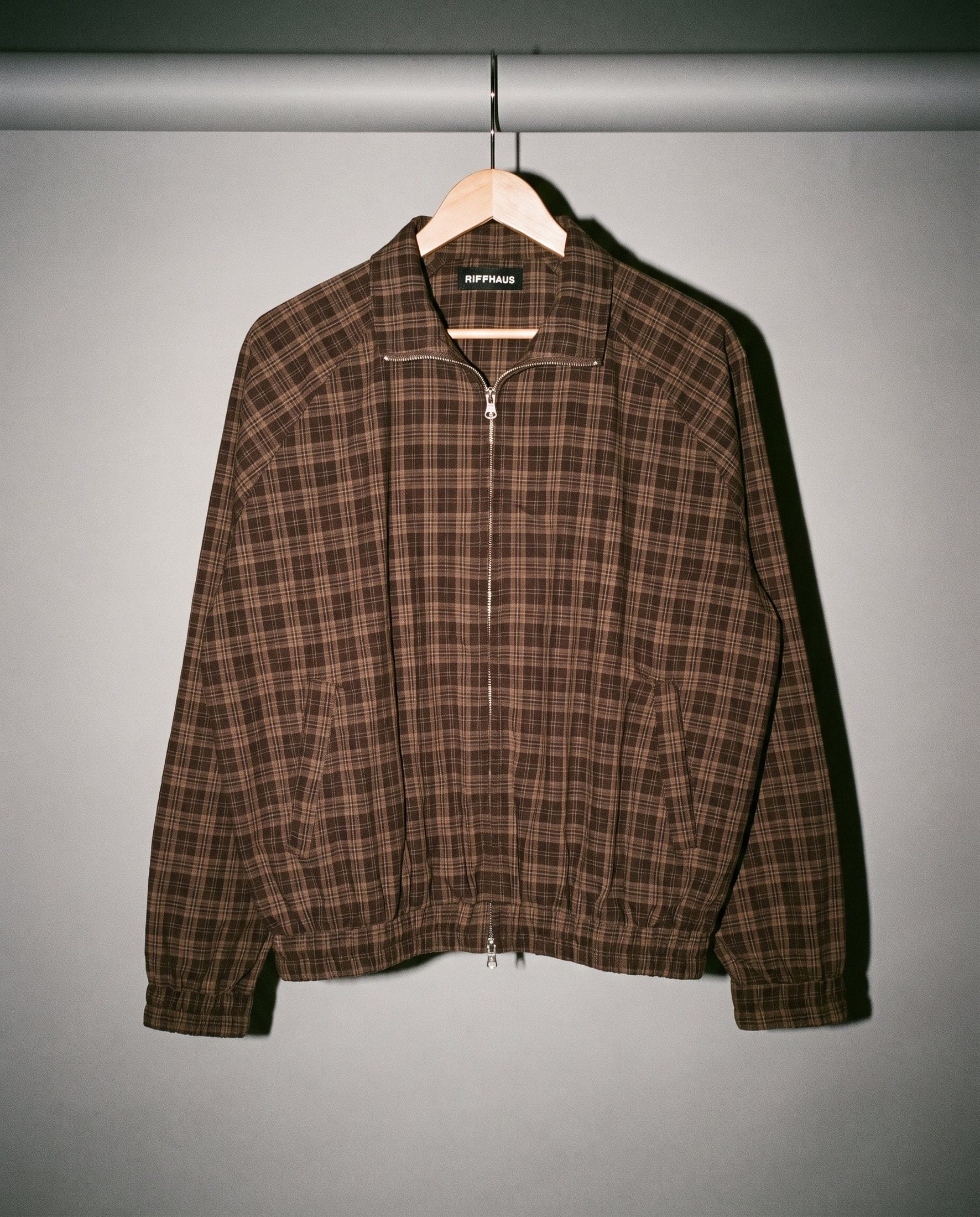 Riffhaus brown plaid zip front jacket with stand collar and pockets