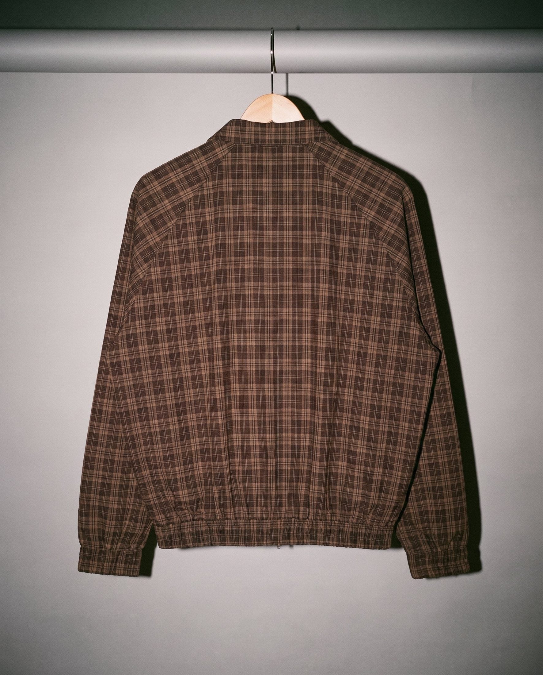 Brown plaid oversized cropped jacket back view with raglan sleeves