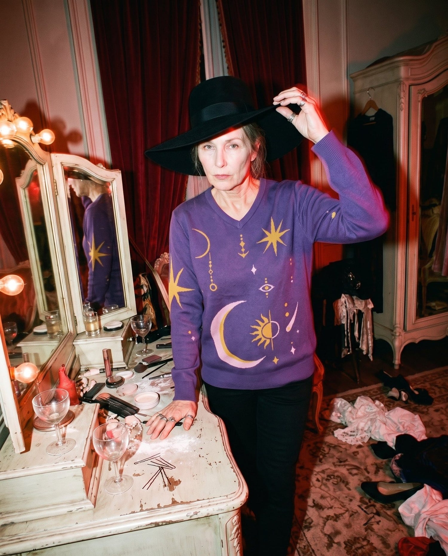 Royal purple celestial jacquard V-neck sweater with gold stars and eye motif